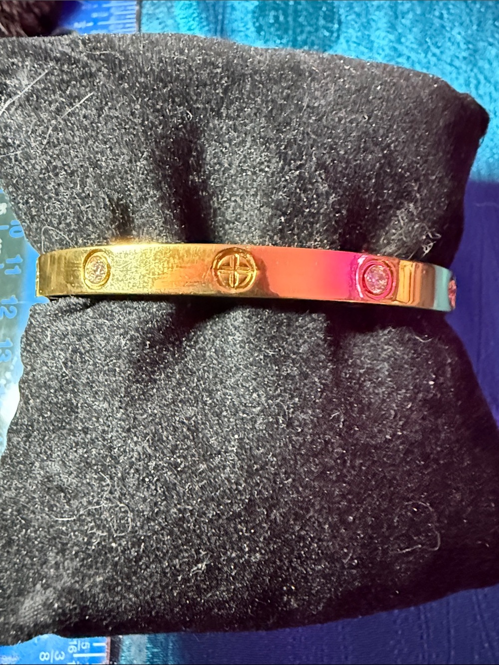 Gold-Tone Bangle Bracelet with Accent Stones
